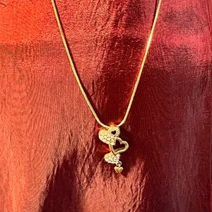 Goldtone Triple Heart necklace